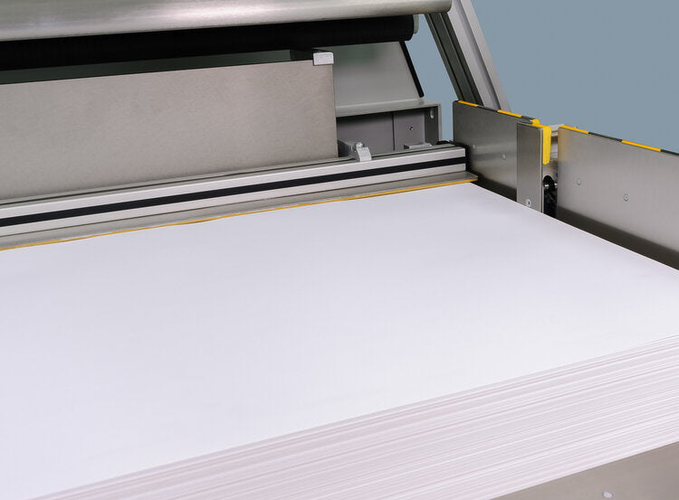 Lift pusher for moving the lift away from the side plate. Allows the air removal roller to cover the entire lift. No margins on either side of the sheet.