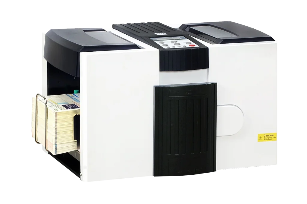 MBM ES 8500 Pressure Sealer with stack of sealed documents in rear output tray, control panel on top, and compact desktop design