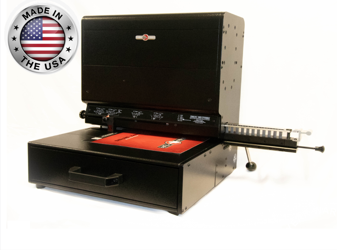 Rhin-O-Tuff Onyx HD7725H Ultima electric paper punching machine with die drawer and side margin guide, labeled 'Made in the USA