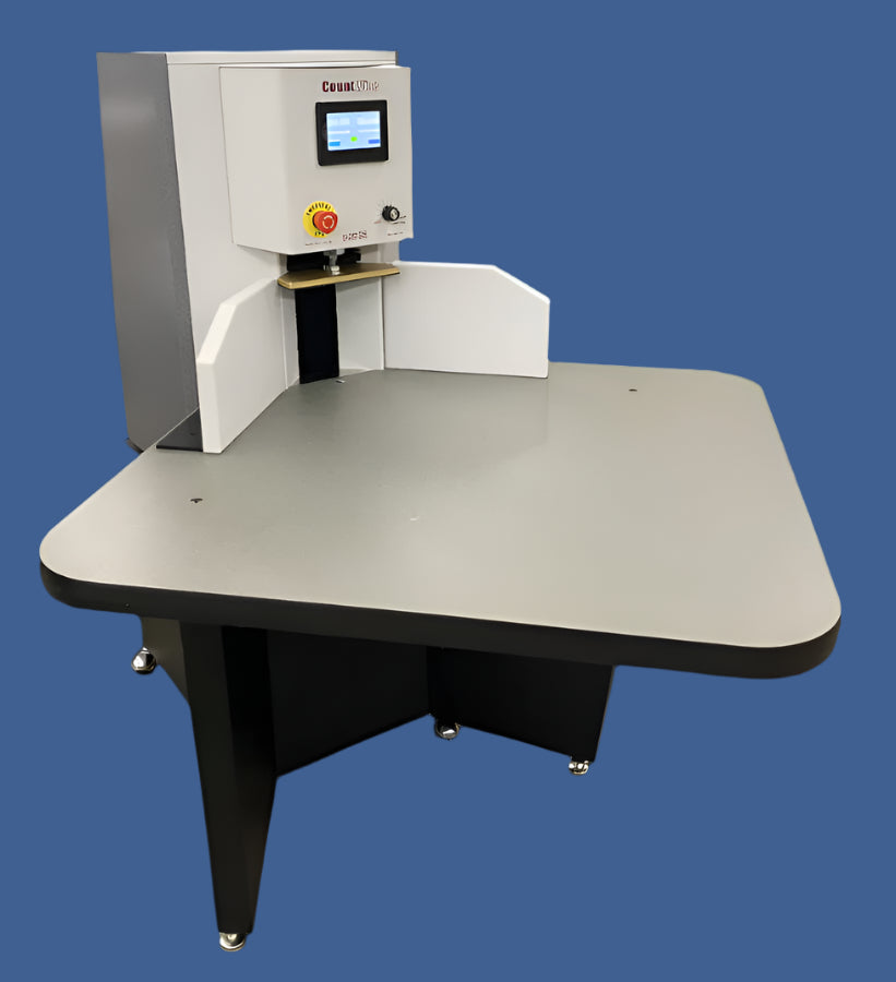 Count-Wise M Paper Counter featuring a touchscreen interface, emergency stop button, and wide counting platform with adjustable guides on a sturdy metal base