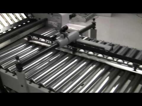 BAUM 1620 running in tandem with right angle to make 7 panel Z fold video