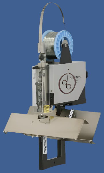 DeLuxe StitchMaster single-head wire stitcher with spooled wire feed and adjustable table