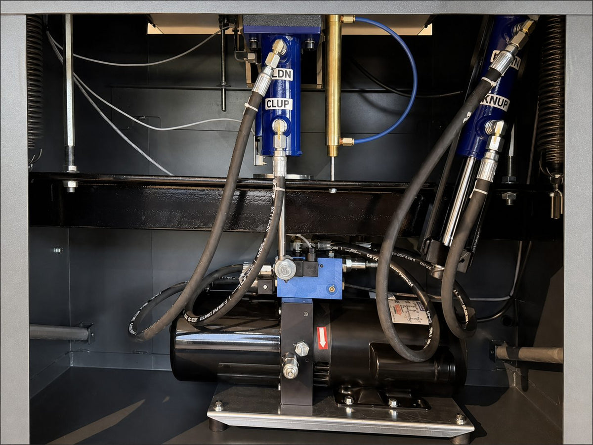 Titan 230 Pro hydraulic power unit, cylinders, hoses, and valve blocks inside the cutter cabinet