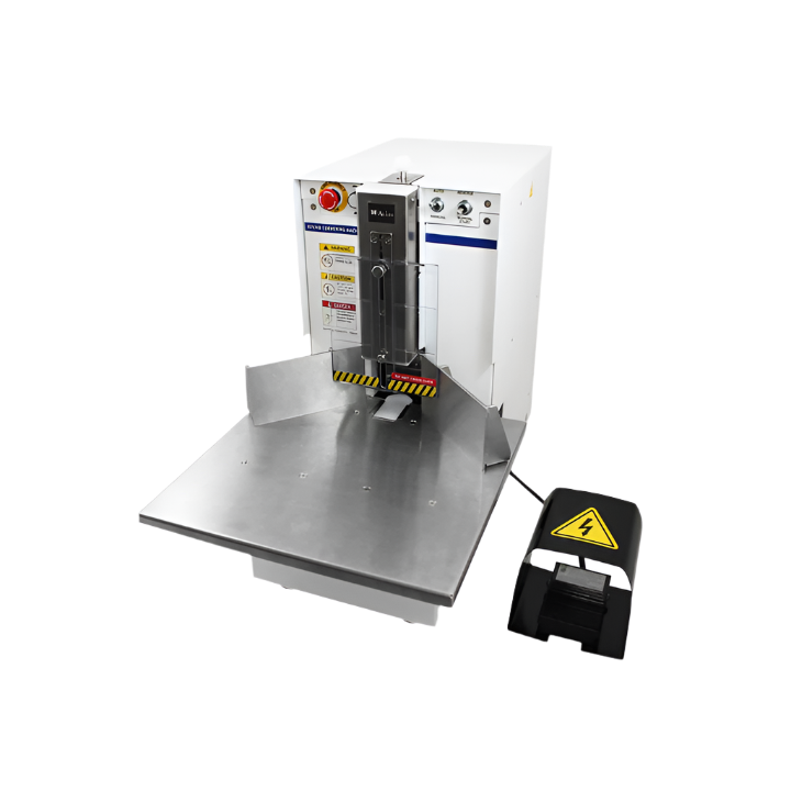 Akiles Diamond-7 heavy-duty electric corner rounder with foot pedal, stainless steel work surface, and safety guard.