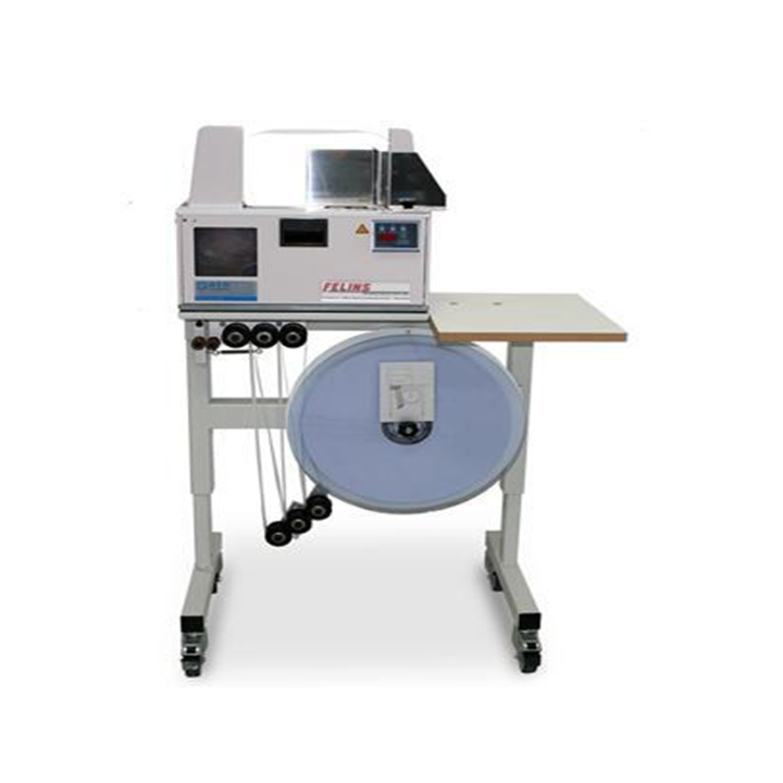 Felins CE Series heat seal banding machine with roll dispenser and wheeled stand, designed for efficient paper and plastic banding operations