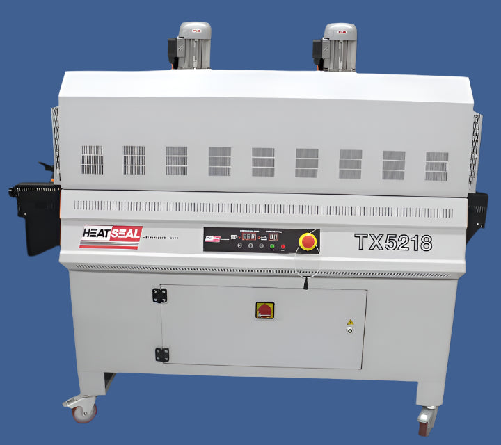 Heat Seal TX5218 heavy duty shrink tunnel featuring a front-mounted control panel, dual top-mounted blowers, ventilation slots, and locking caster wheels.
