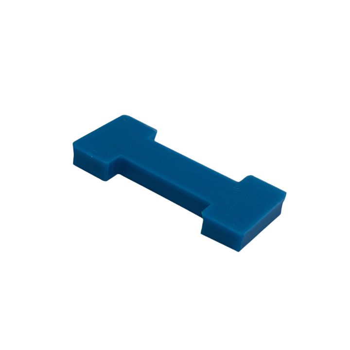 Eco 1630 Safety Interlock Tool – blue plastic I-shaped device used for bypassing safety interlocks during service or maintenance.