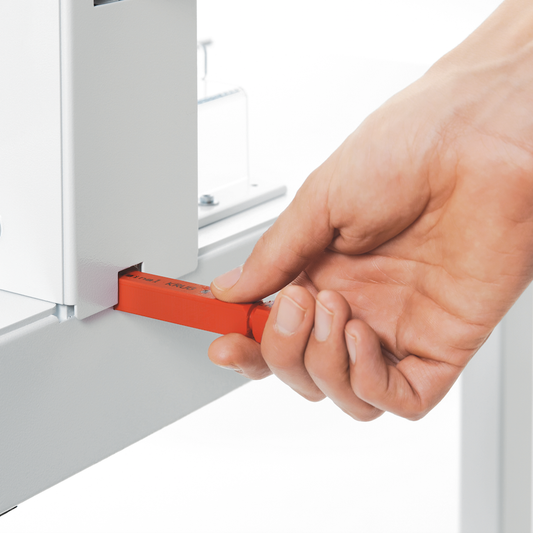 Hand changing MBM Triumph 4305 knife using orange tool