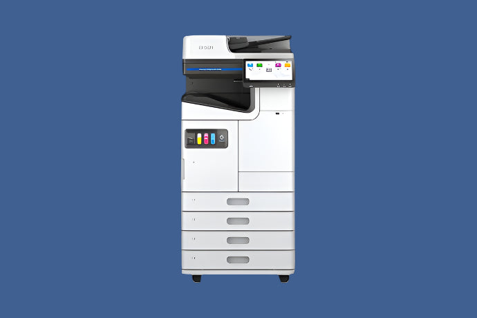 Epson WorkForce Enterprise AM-C6000 Color Multifunction Printer — Head-On View with Visible Ink Compartments, Four Paper Trays, and Large Touchscreen Display