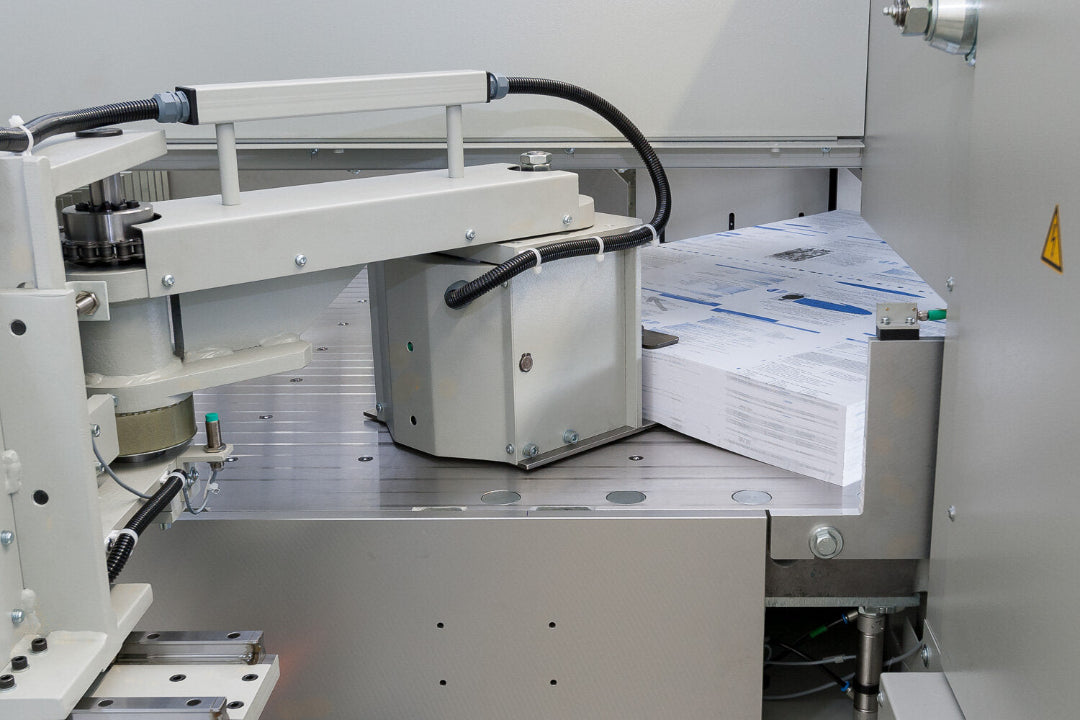 Affordable fully automatic 4-side cutting up to 30.3” x 42.1” with the BDG 3e on a BAUMANN-PERFECTA BP 132