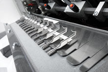 Built in spine former storage