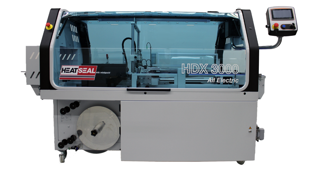 Heat Seal HDX 3000 All-Electric Shrink Wrapping Machine with Clear Safety Enclosure, Integrated Touchscreen Controls, and Film Roll Holder