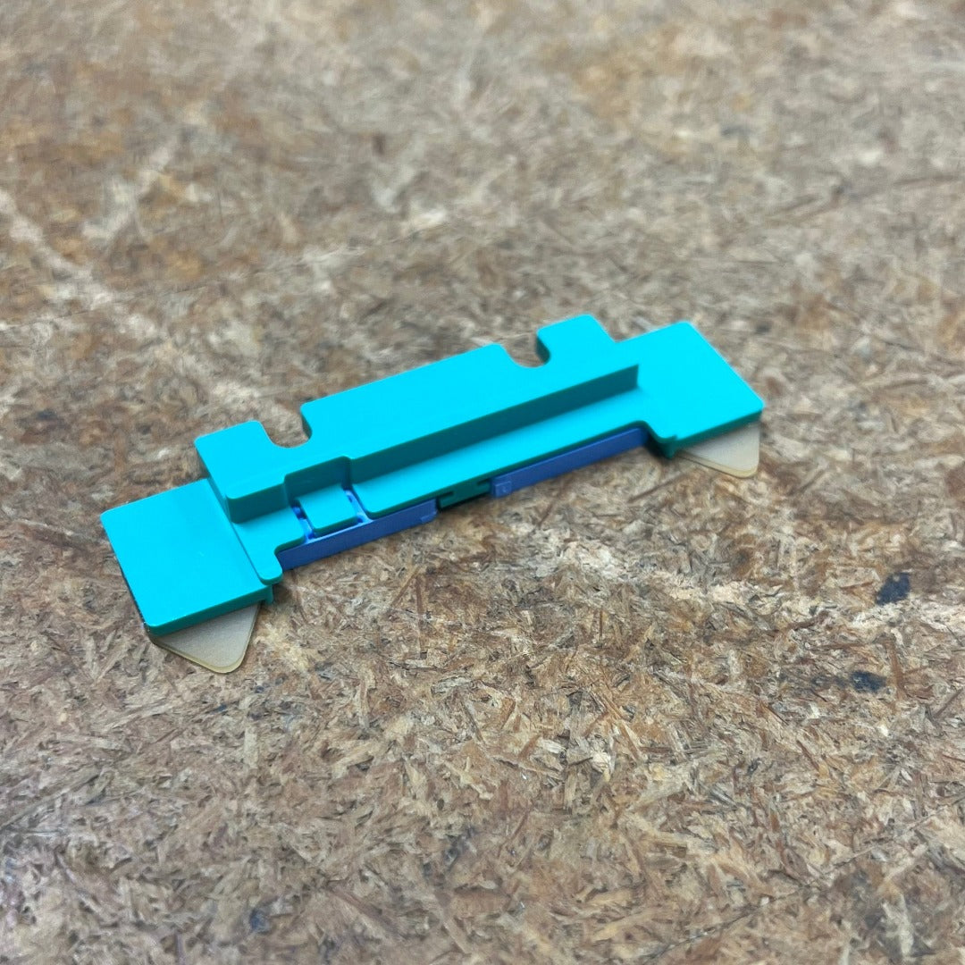 Green double feed stop plate for print finishing and paper handling equipment alignment