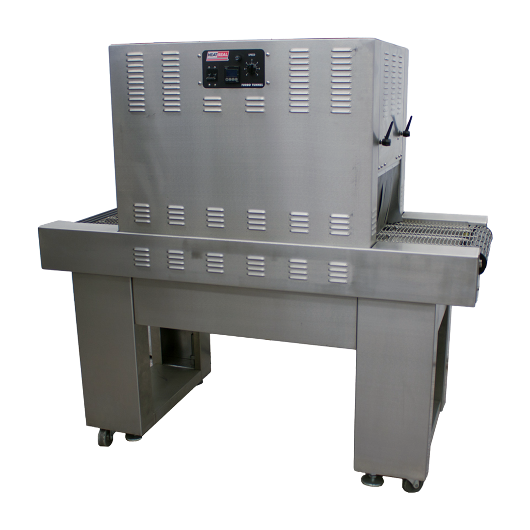 Stainless steel Heat Seal T3417 shrink tunnel with digital control panel, vented housing, and mesh conveyor on locking casters.