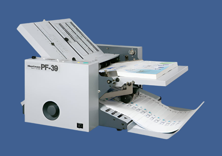 Horizon PF-39 paper folder machine shown folding color-printed sheets with adjustable fold plates and compact desktop design
