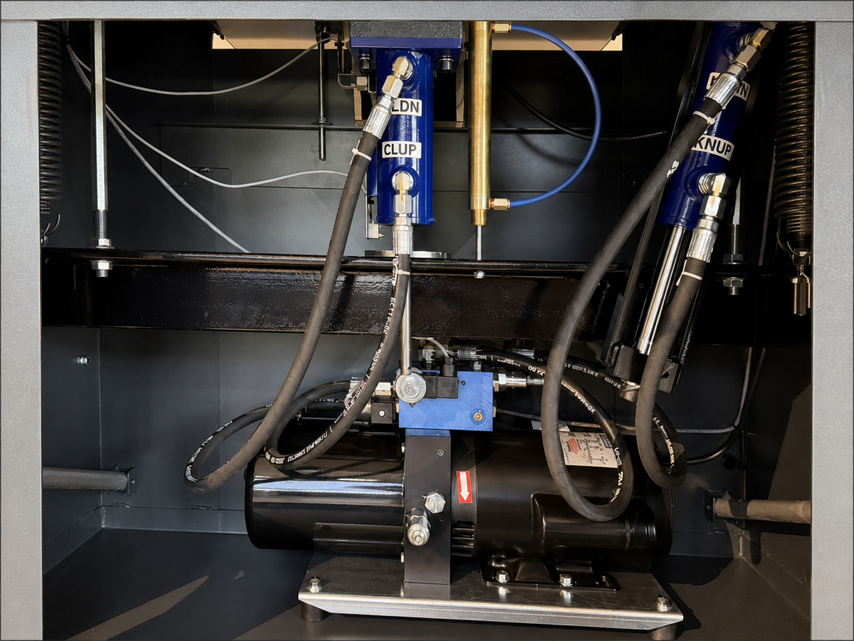 Titan 230 Pro hydraulic power unit, cylinders, hoses, and valve blocks inside the cutter cabinet
