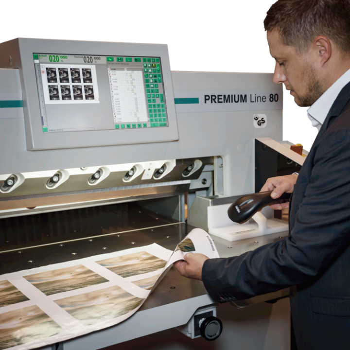 Perfecta 115 TS 45" High-Speed Paper Cutter In Use