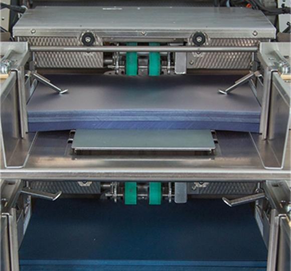 Rhin-O-Tuff Tornado Autopunch EX punch tray detail — Mid-State Litho